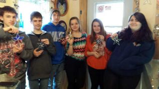 L-R: Anthony Shorts, Kiernan Grand, Alex Flagler, Kara Rosien, Shannon Rosenblath, and Selena Pelicos show off their sun catchers.